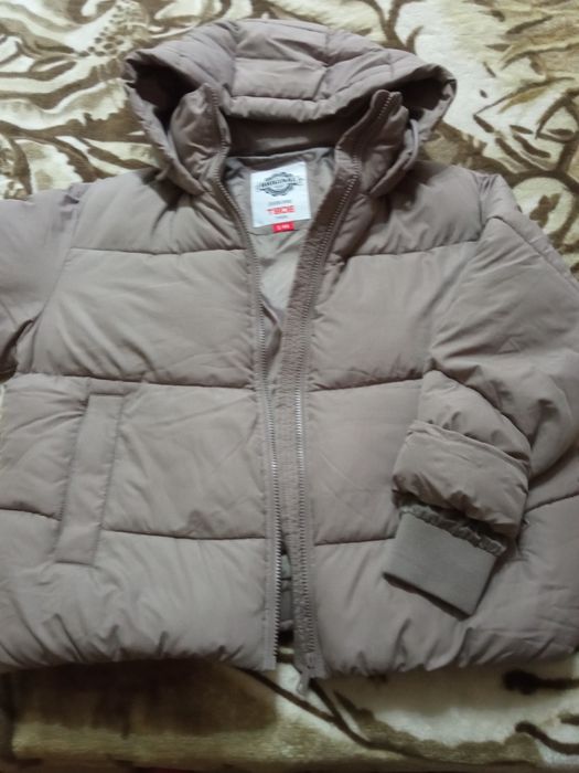 Продам пуховик женский