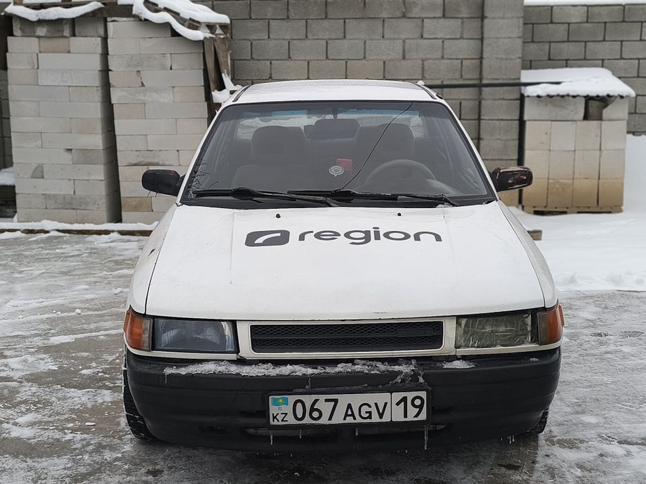 Машина Мазда рабочая лошадка