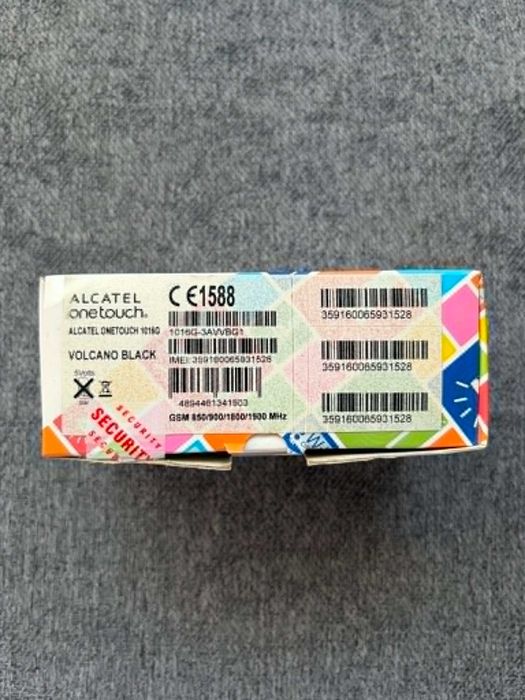 телефон Alcatel OneTouch