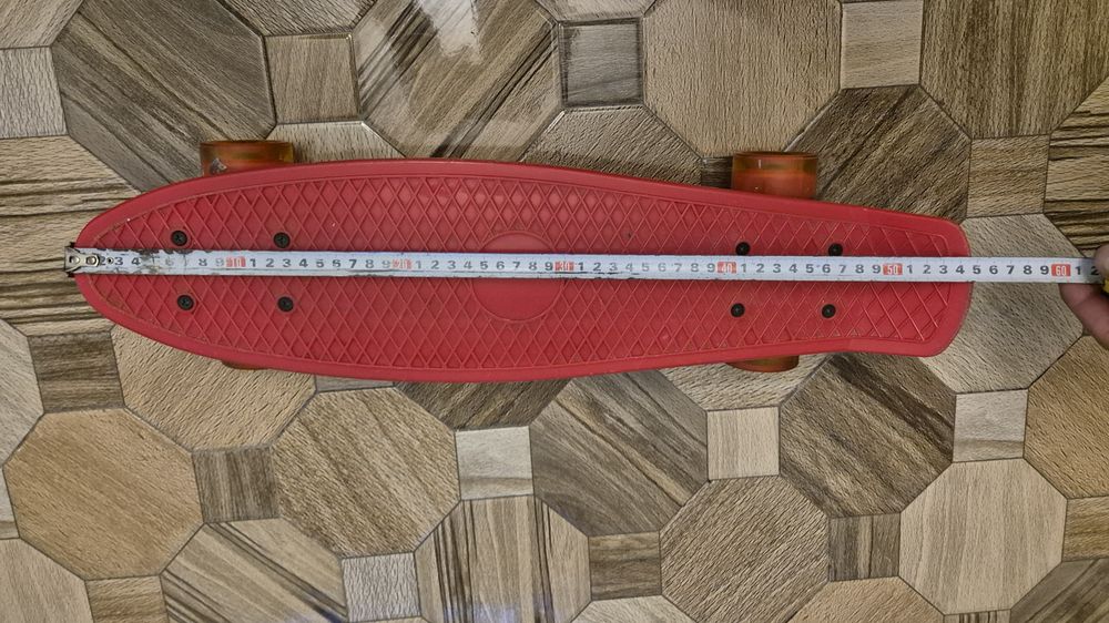 Skateboard Penny Board cu Lumini rosu ca nou