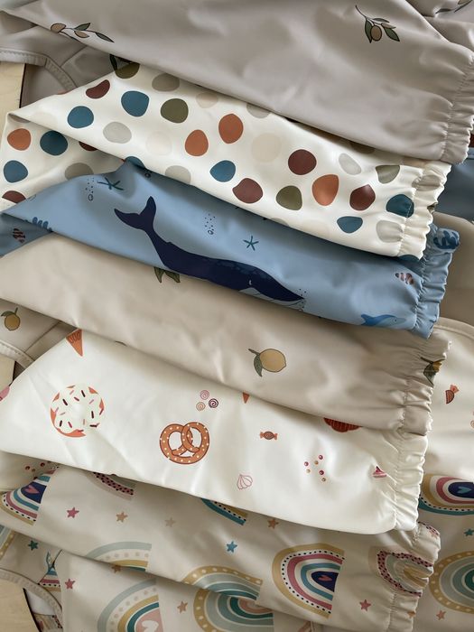 Лигавник с ръкави и джобче