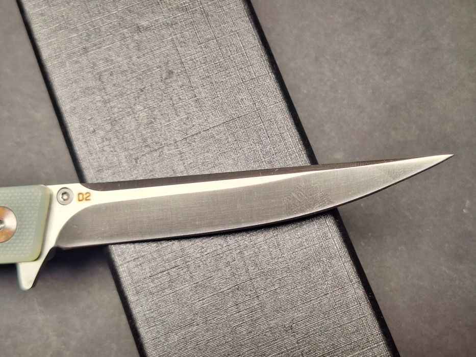Сгъваем нож-стомана D2-дръжка G10