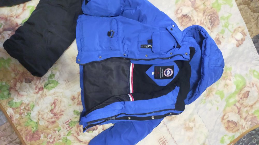 Продам комбинезоны на девочку и мальчика