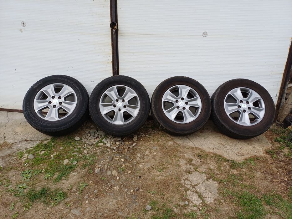 Jante aliaj 16"orig.DACIA DUSTER anv.Vara Continental 215/65/16