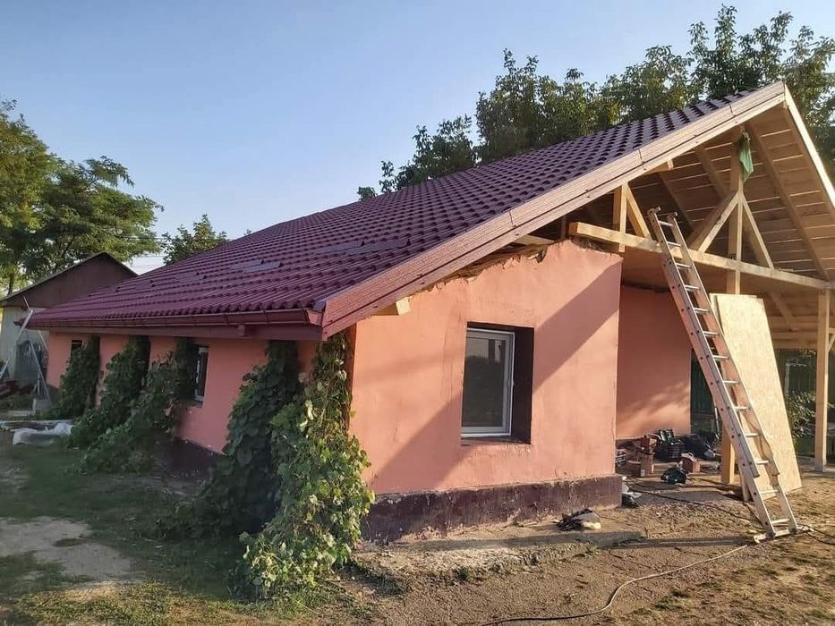 Executam acoperișuri/terase/ reparați