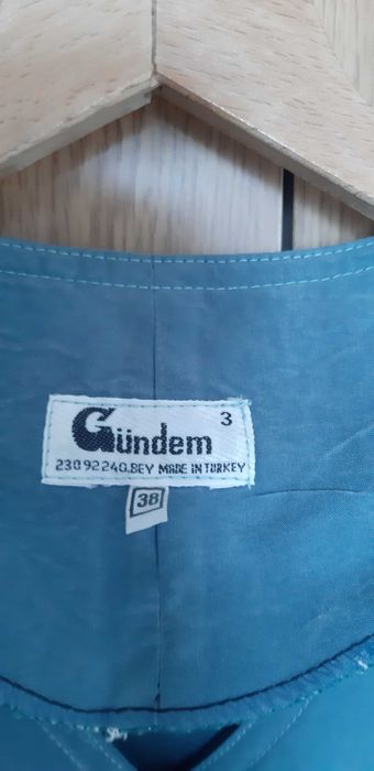 Дамски маслено зелен костюм