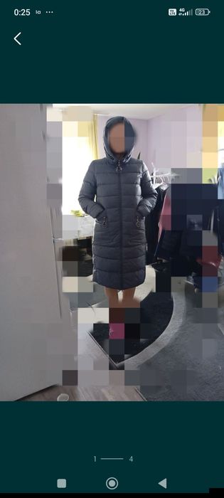 Продам пуховик Xaski