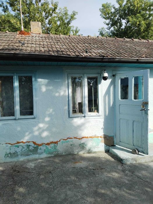 Casa batraneasca cu teren intravilan la drum national
