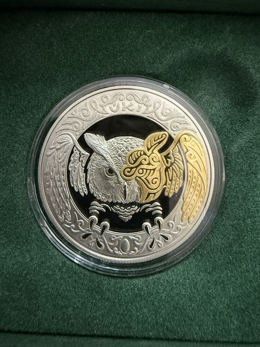 Поодам филина proof like