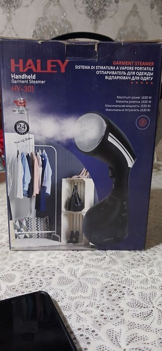 Паравой утюжок новый