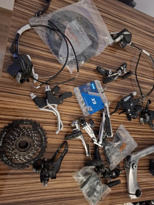 Piese bicicletă  – manete, schimbătoare, frâne, pinioane, lanț nou