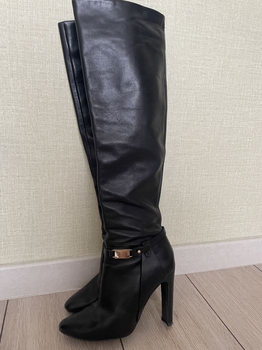 Продам кожаные сапоги