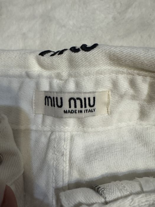 Blugi albi miumiu