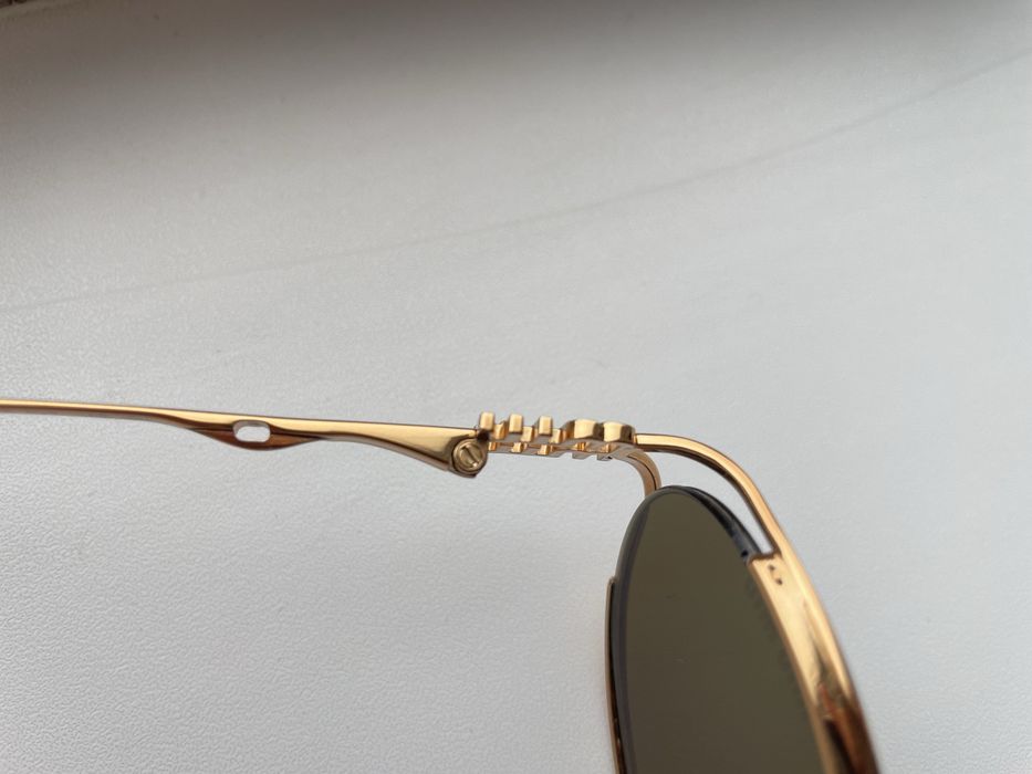 Солнцезащитные очки Miu Miu