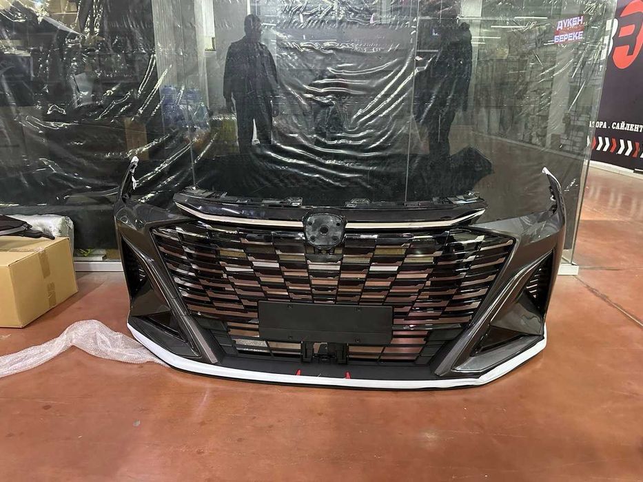 передний бампер оригинал