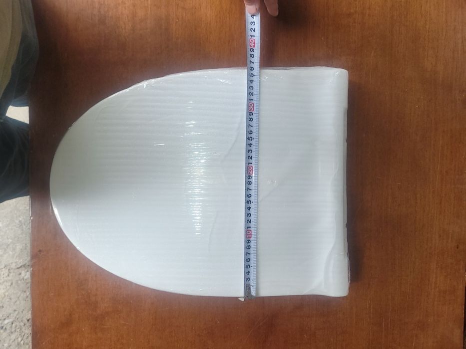 Крышки (сидушки)на унитазы и на литые унитазы