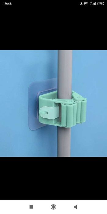 Стойка за моп към стената