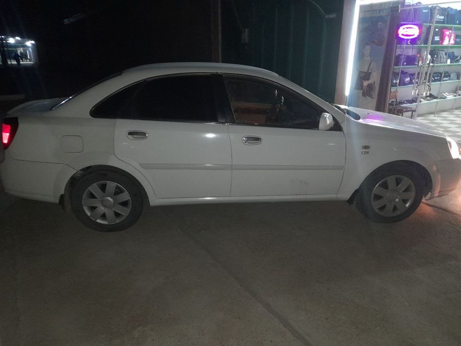 Шевролет ласетти 1.8