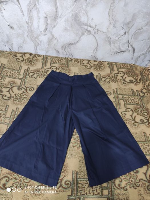 Одежда и обувь б/у