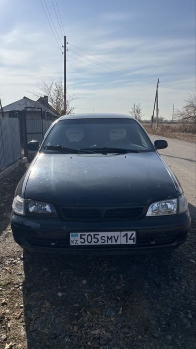 Тойота карина е.