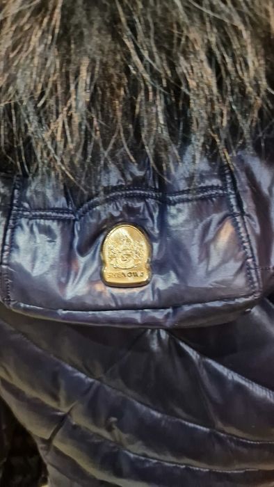 Теплый женский пуховик интересной модели