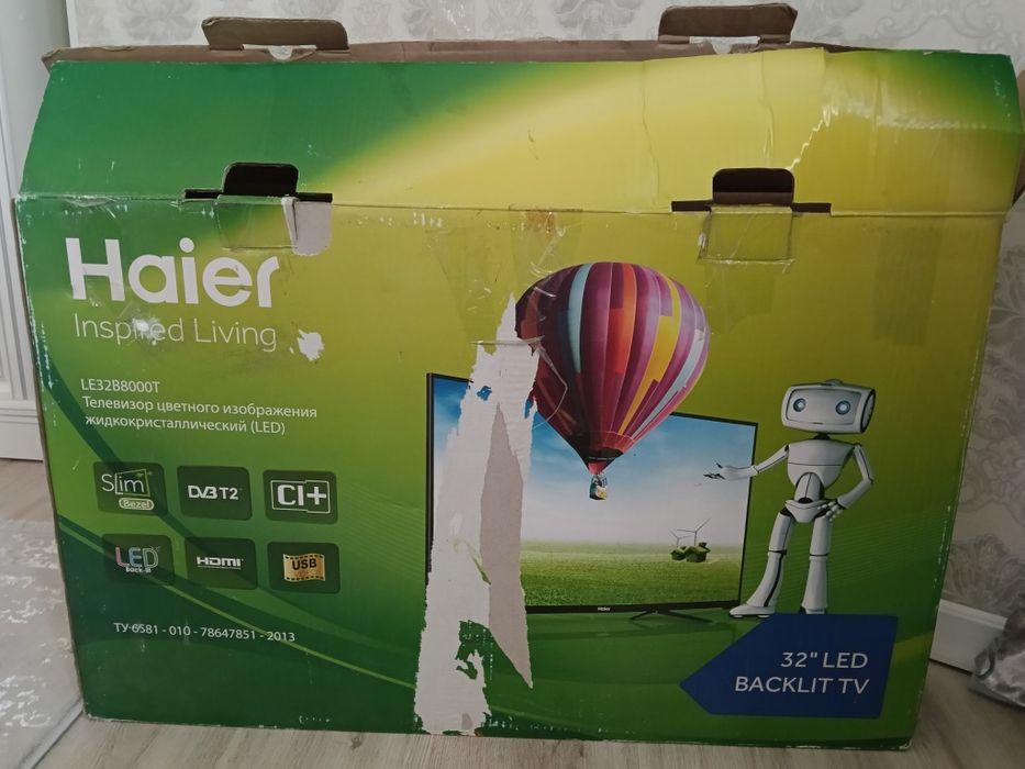 Телевизор бренда Haier.