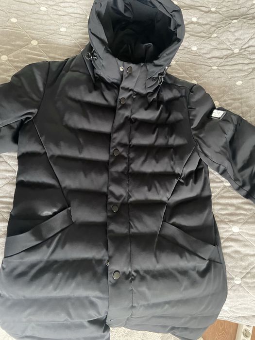 Прллам зимнюю куртку Calvin Klein