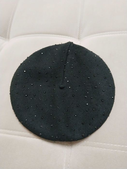 Продам вязанную шапку.