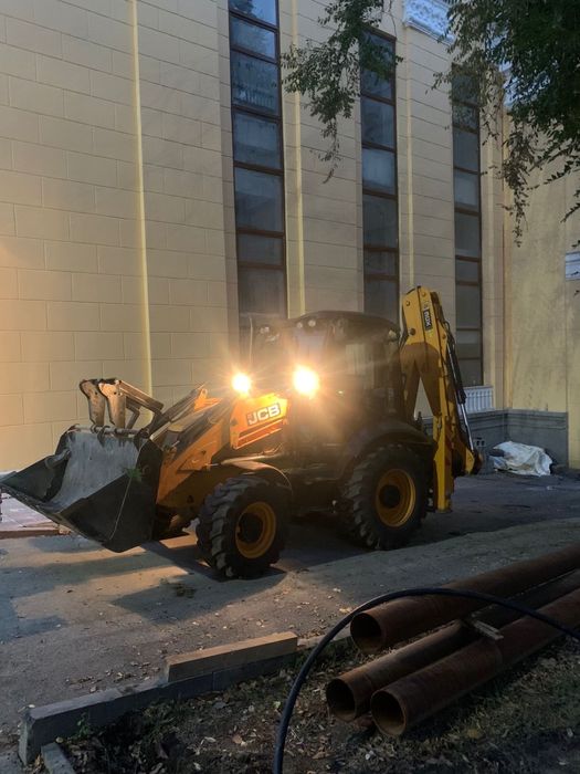 услуги экскаватор погрузчик