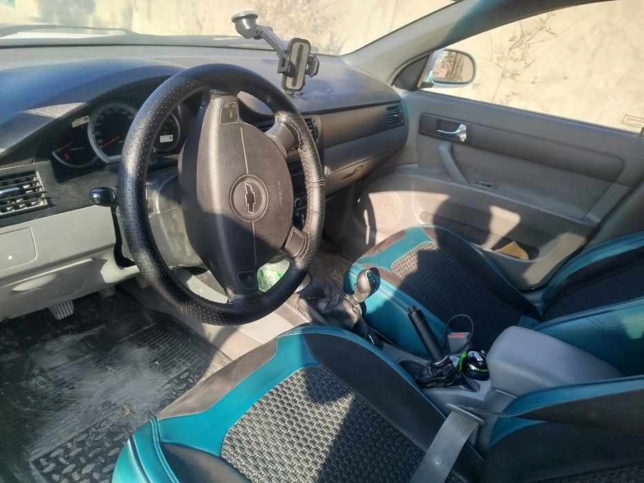 Lacetti 1.8 holati yangi kraska toza