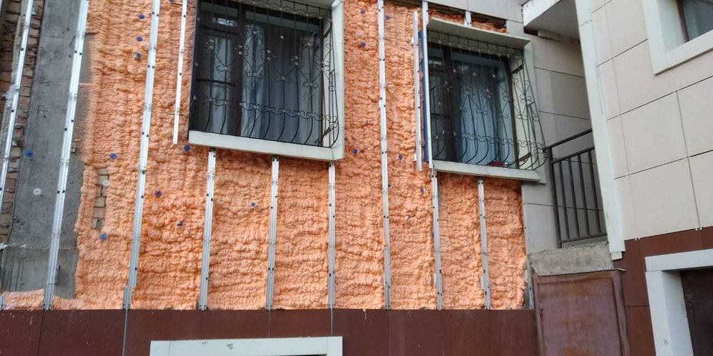 утепление домов POLYNOR