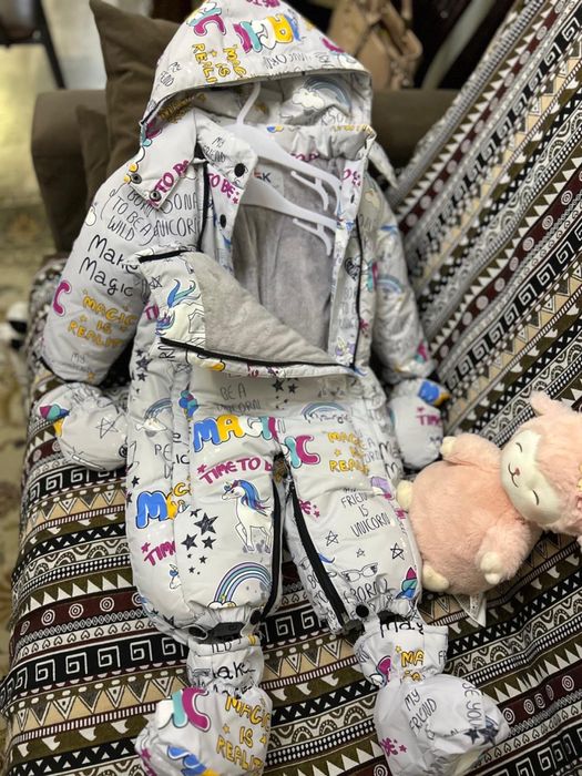 Новый комбинезон размер 68-74 свободно