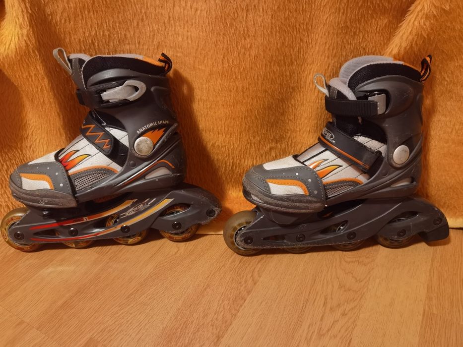 Role / patine reglabile 31-33