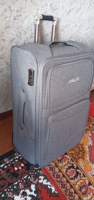 Роликовый чемодан