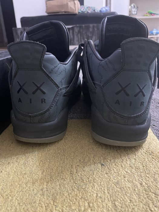 Jordan 4 Black Kaws