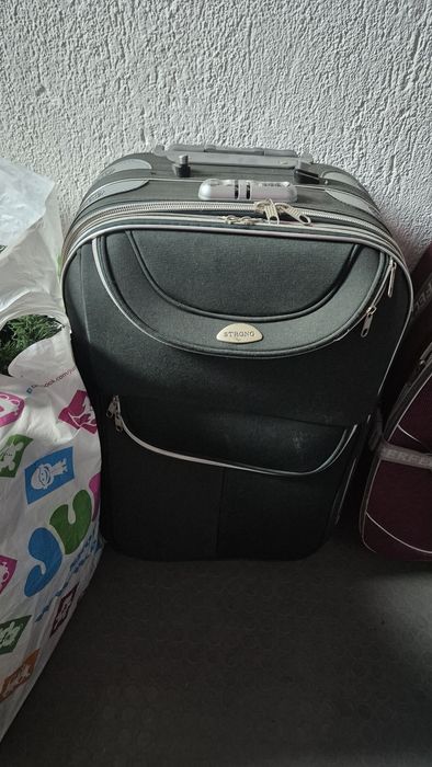 Куфари за път средна големина