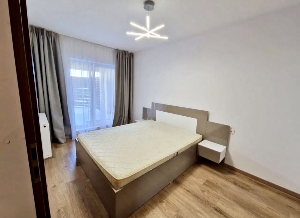 Inchiriez apartament 2 camere + gradina + parcare subterana