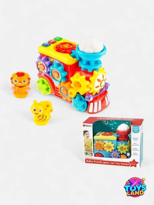 Яркий музыкальный паровозик с подвижными шестерёнками,милыми зверятами