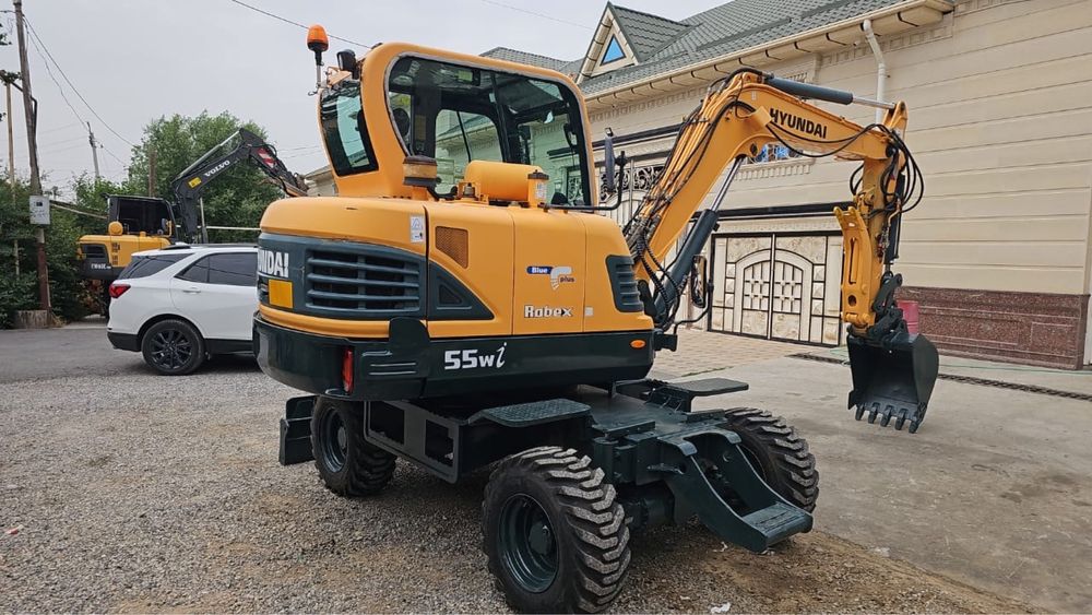 Колесный ЭКСКОВАТОР 210 и 140