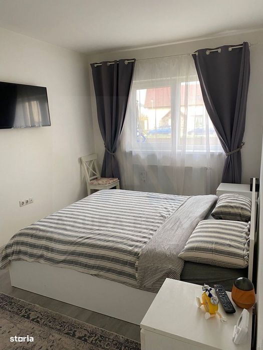 Apartament cu 3 camere 2 bai curte individuala 74 mp în Șelimbăr
