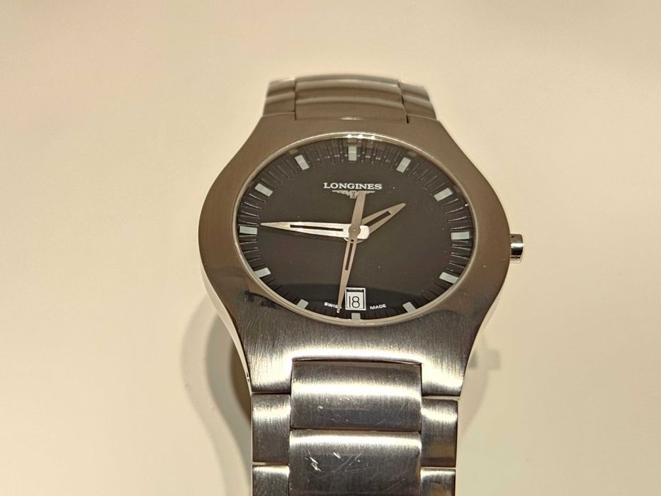 Продаван елегантен стомана кварц мъжки  дамски часовник"Longines"