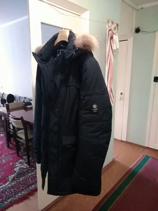 Продам зимний пуховик