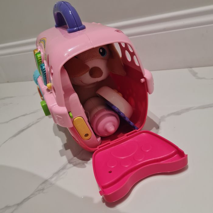 Интерактивна играчка Vtech с куче и клетка за пренасяне.