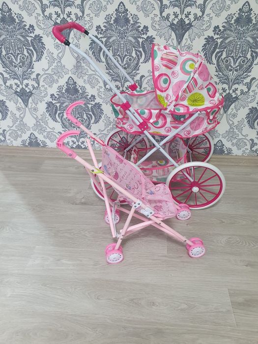 Игрушечная коляска для кукол
