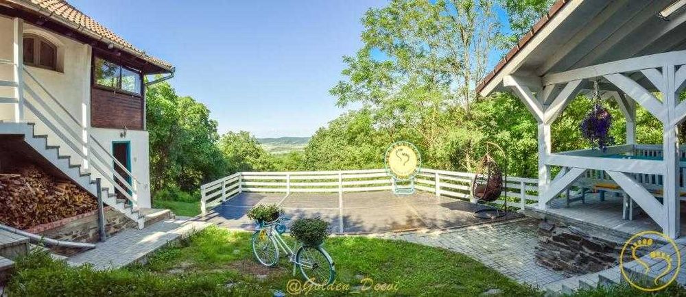 Inchiriez integral  casa de vacanta