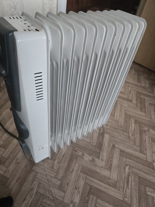 Маслянный обогреватель