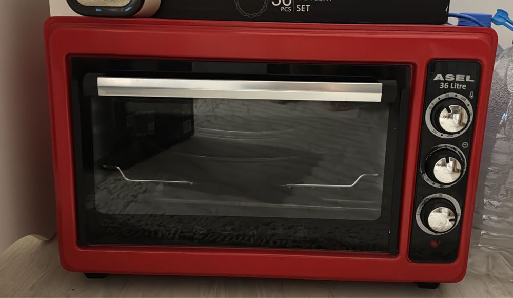 Продам вешалку,печку и пароварку