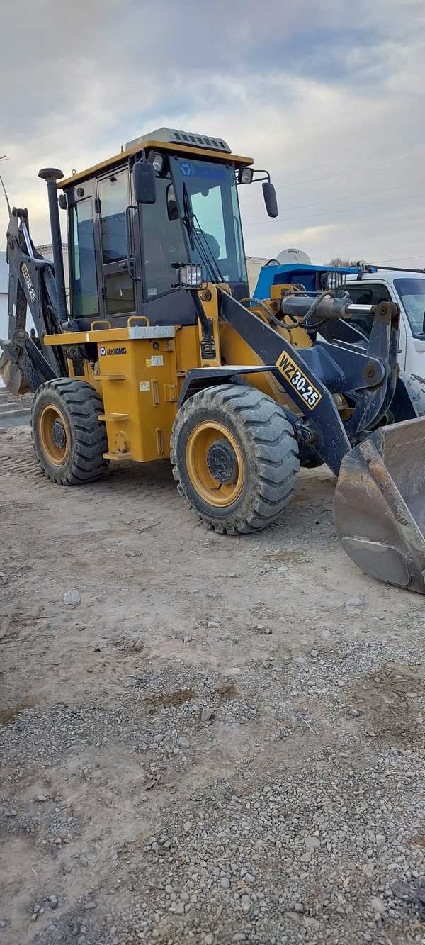 Wz 3025. New Holland b80b. Нью Холланд экскаватор погрузчик в80в. Экскаватор New Holland b80b. Экскаватора New Holland b 80.