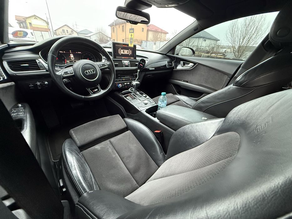 Audi RS7 bi-turbo 313 cp