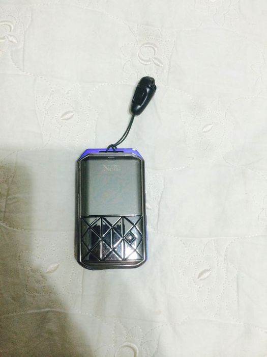 Сотовый телефон. Очень маленький